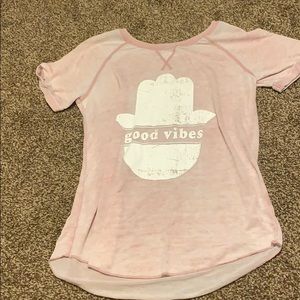 Shirt that says “good vibes”